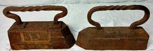 lot 122 image: Pair of Antique Cast Iron Sad Irons - 22lb and 28lb with Twisted Handles