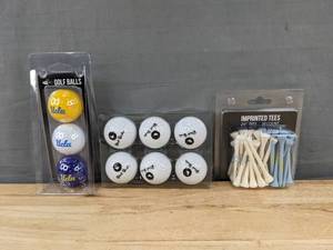 lot 68 image: Brand New UCLA Bruins Golf Balls and Tees Lot - 6 Black Birdie Balls, 3 UCLA Balls, 50 Tees