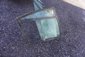 lot 16 image: John Deere Model 104F1156 Skid Loader SideDoor Panels