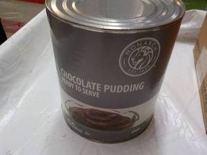 lot 251 image: 7 lb. Can Chocolate Pudding...