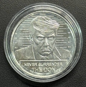 lot 32 image: Donald Trump Silver Round Featuring The Don and The White House