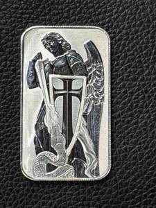 lot 198 image: Scottsdale Mint 1 Troy Oz .999 Fine Silver Bar with Archangel Design