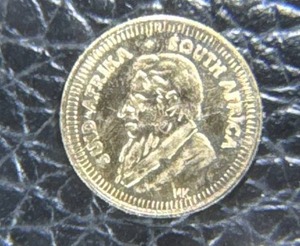 lot 3 image: Miniature 1980 14K Gold Krugerrand Coin with Certificate of Authenticity