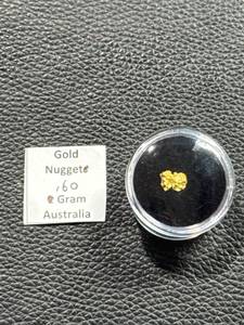 lot 59 image: 0.60 Gram Australian Gold Nugget in Display Case