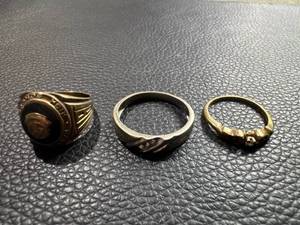 lot 80 image: Three Rings Featuring a Class Ring, Band, and Gold-Tone Diamond-Style Ring