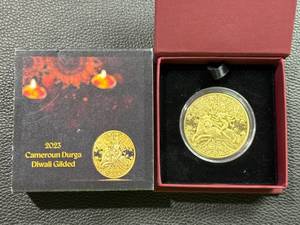 lot 96 image: 2023 Cameroon 2000 Francs CFA Diwali Durga Gold-Plated Silver Coin