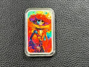 lot 104 image: 1oz .999 Silver Bar in Protective Case with Colorful Artwork