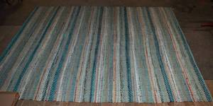 lot 12 image: Safavieh Montauk 8x10 Rag Rug  Shades of Blue