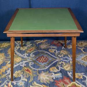 lot 29 image: Mid-Century Modern Folding Table  Green Naugahyde Top & Walnut Frame