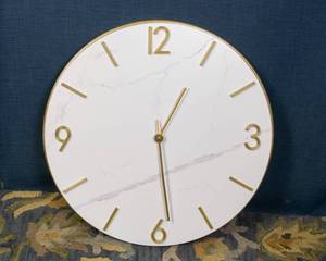 lot 33 image: Marble Look Wall Clock