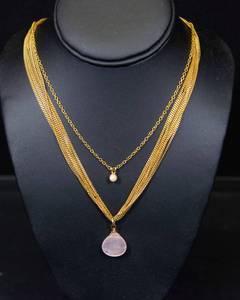 lot 76 image: Set of Two Gold-Tone Necklaces