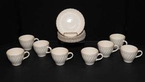 lot 74 image: White Cups and Saucers Set with Gray Edging  14 Pieces