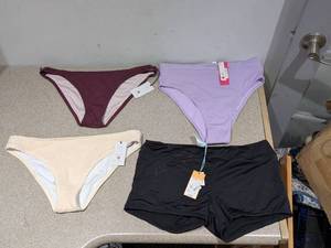 lot 34 image: (4) NEW WOMENS ASSORTED SWIMWEAR BOTTOMS (LARGE)