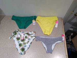 lot 40 image: (4) NEW ASSORTED WOMENS SWIMWEAR BOTTOMS (MEDIUM)