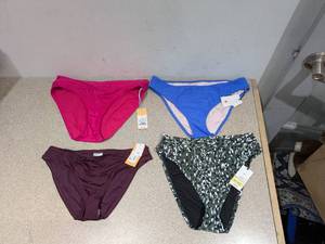 lot 41 image: (4) NEW ASSORTED WOMENS SWIMWEAR BOTTOMS (MEDIUM)