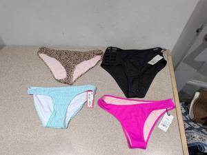 lot 55 image: (4) NEW ASSORTED WOMENS SWIMWEAR BOTTOMS (SMALL)