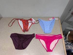 lot 57 image: (4) NEW ASSORTED WOMENS SWIMWEAR BOTTOMS (SMALL)