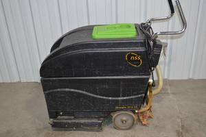 lot 23 image: NSS Wrangler 2010 AB Floor Scrubber With On-Board Charger