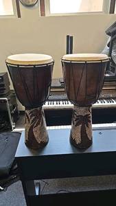 lot 19 image: Pair of Hand-Painted Djembe Drums with Rope Tuning, 12 Diameter