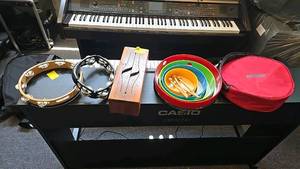 lot 20 image: Nino Percussion Instrument Set, 5 Pieces, Various Colors, Carrying Bag, tambourines, wood music box.