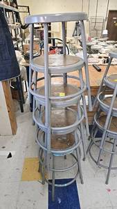 lot 71 image: (5) Stackable Metal and Wood BarCounter Stools, Gray Frame, Natural Wood Seat.