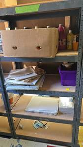 lot 93 image: Black Metal Shelving Unit, 4 Shelves, contents included.