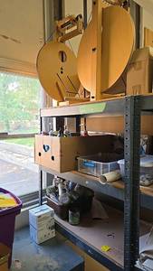 lot 94 image: Black Metal Shelving Unit, 4 Shelves, contents included.