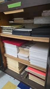 lot 99 image: Art and Craft Paper Supplies, Various Colors and Uses, Multiple Brands, all contents inside bookcase.
