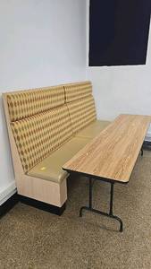 lot 102 image: Restaurant Booth Seating, BeigeYellow, 3-4 Person Capacity, Wood Frame and folding table.