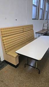 lot 106 image: Restaurant Booth Seating with Table, Yellow and Brown Fabric, White Folding Table