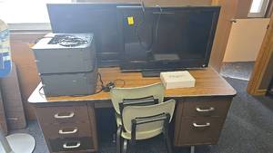 lot 133 image: Wooden desk, (2) Brother HL-L2360DW printers, (2) Vizio TVs, chairs included.