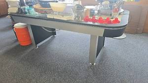 lot 135 image: Harvard Air Hockey Table with Electronic Scoreboard and Red Paddles. Other contents on top of the table are NOT included.