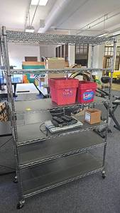 lot 137 image: Metal Wire Shelving Unit, 6 Shelves, 72x48x18, Caster Wheels, Silver, contents included.