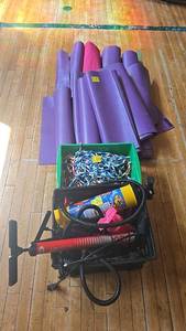 lot 163 image: Bike Tire Pump, Jump Ropes, Assorted Yoga Mats.