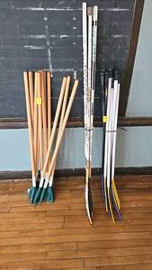 lot 169 image: Broomball, and Hockey Sticks.