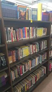 lot 209 image: Bookshelf with Approximately 100 Books, Mixed Genres including Witness by Karen Hesse, Hardcover.