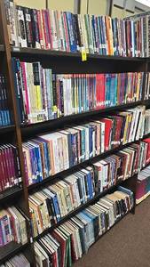 lot 221 image: Large Library Collection with Mixed Genres and Formats