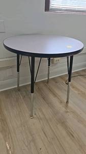 lot 276 image: Round Table, Adjustable Metal Legs, Light Grey Laminate Top