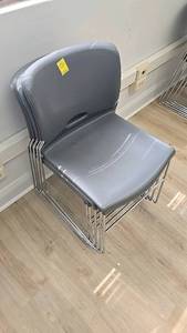 lot 277C image: (5) Five, Gray Stackable Chairs, featuring chrome metal frame