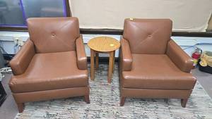 lot 303 image: (2) Brown Faux Leather Armchairs with Wood Side Table Furniture Set