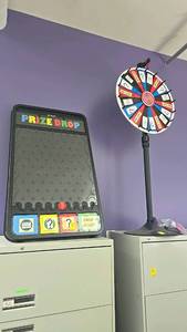 lot 305 image: Prize Drop Game and Prize Wheel, Multicolored, Plastic Material