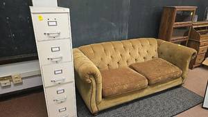 lot 518 image: 5-Drawer Beige Metal Vertical Filing Cabinet and brown couch