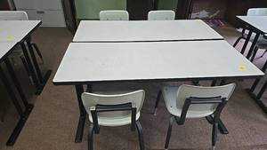 lot 556 image: School Classroom Furniture Set, Metal Frame with Plastic Top, 2 Tables, 4 Chairs