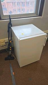 lot 576 image: Danby DCR158W Mini Fridge, 1.6 cu.ft. Capacity, Eureka NES210 Vacuum Cleaner