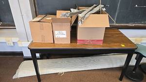 lot 589 image: Office Supplies and Furniture Lot, Includes Table and Educational Materials