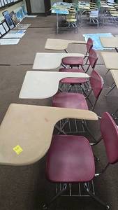 lot 610 image: (4) School Desks with Attached Chairs, Red Seats, Beige Desktops