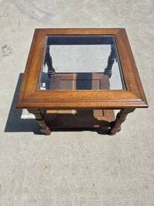 lot 122 image: Glass top wooden side table