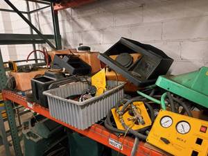 lot 122 image: Lot of (Shelf Contents) Tanks, Casters for Various Fluid Exchange Machines
