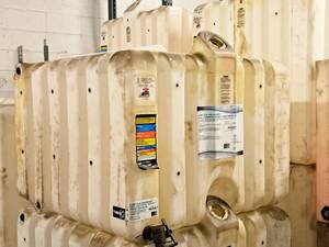 lot 65 image: 120-Gallon Plastic Nonmetallic Bulk Container for StorageDispensing Combustible and Non-Combustible Liquids  Indoor Use Only 36 x 36 x 26 - Rhino Tuff Tanks