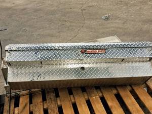 lot 31 image: Weatherguard Truck Bed Tool Box with Extra Mounting Bracket